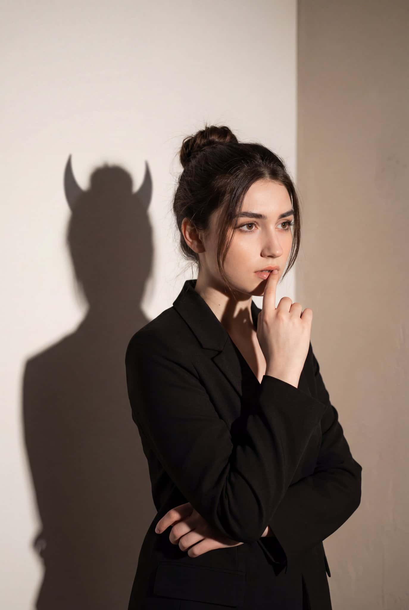 Gemini AI photo prompts preview — Psychological Portrait of a Woman in Black and the Shadow of a Demon